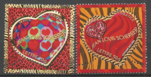 two stamps with hearts and leopard print